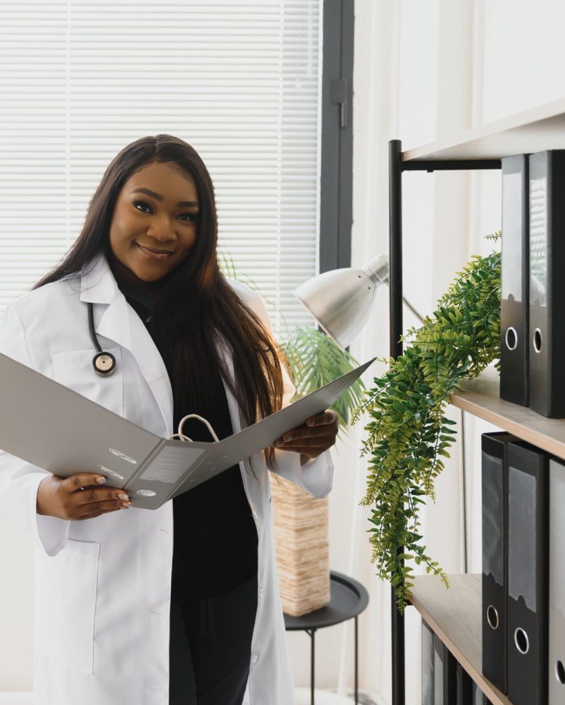 medicine, people and healthcare concept - african american female doctor or nurse at hospital